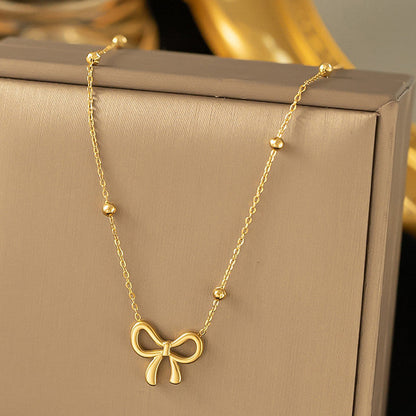 Anti Tarnish Infinity Bow Pendant Set Gold Plated