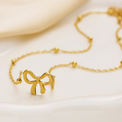 Anti Tarnish Infinity Bow Pendant Set Gold Plated