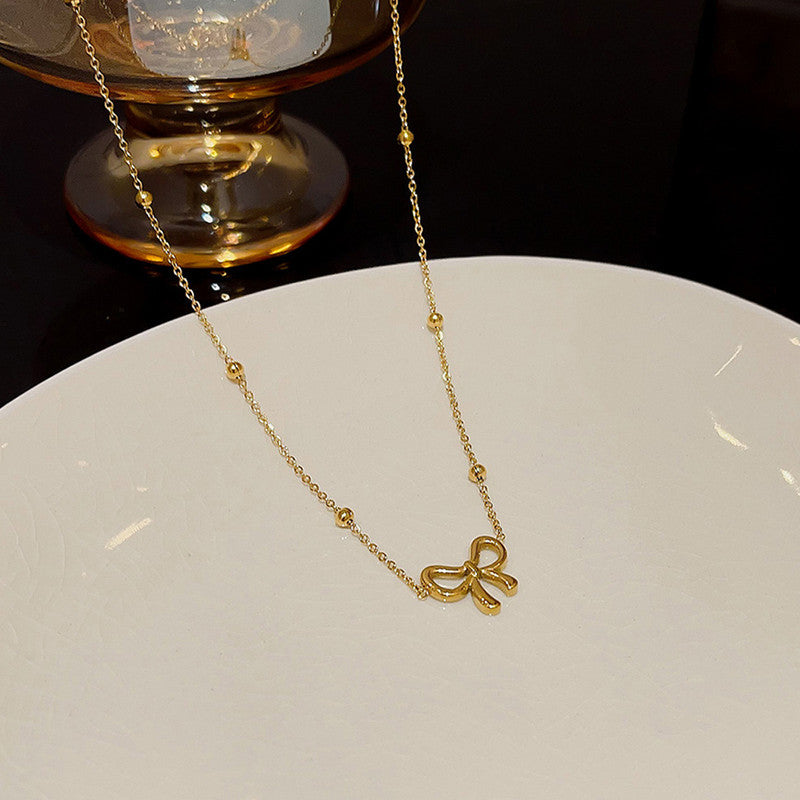 Anti Tarnish Infinity Bow Pendant Set Gold Plated