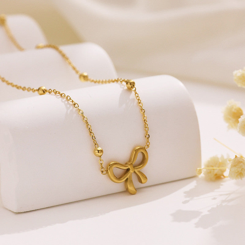 Anti Tarnish Infinity Bow Pendant Set Gold Plated