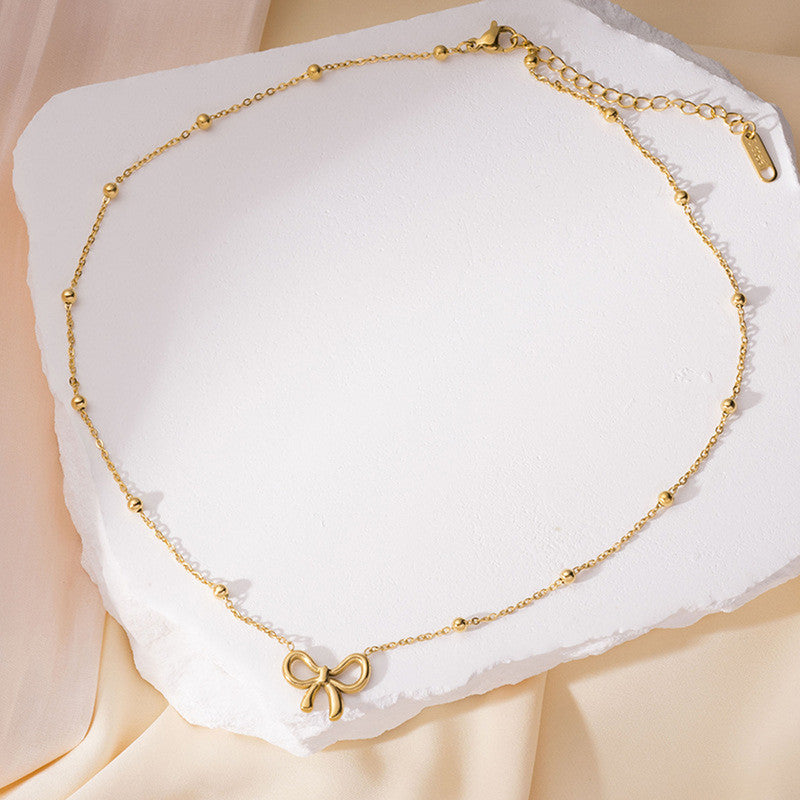 Anti Tarnish Infinity Bow Pendant Set Gold Plated